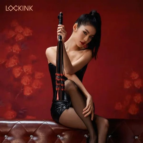 Флогер з вузликами на хвостах і текстурованою ручкою Lockink, шкіряний, чорно-червоний, 58 см 803196 /Z-SMD-023-ZTH фото
